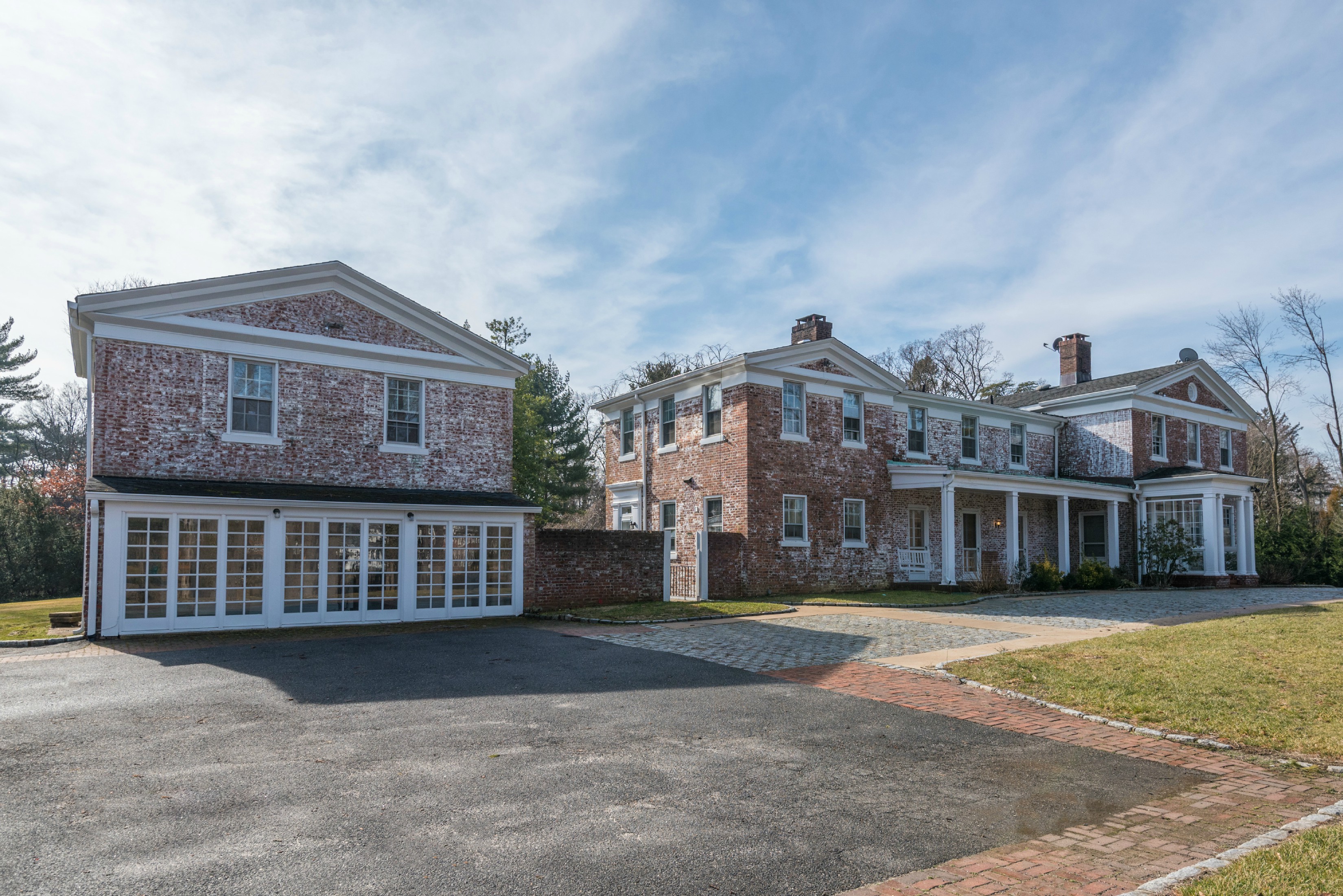 Back on the market!  Charming White Washed Brick Country Estate