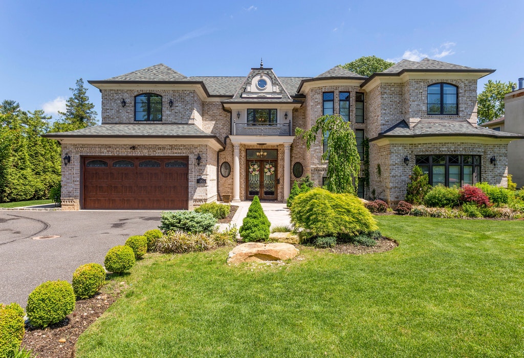 Just Listed!  Incomparable French Country Colonial in Roslyn Country Club