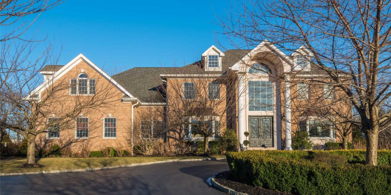 Just Listed!  Superlative All Brick, Like-New, Center Hall Colonial in Old Westbury