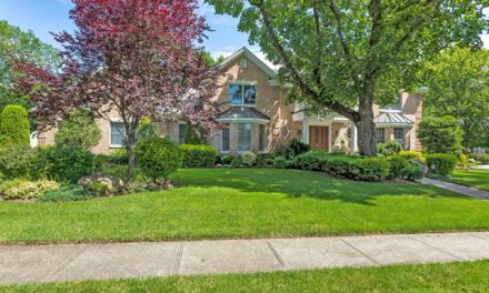 Price Improved!  Regal Brick Colonial in Roslyn Country Club